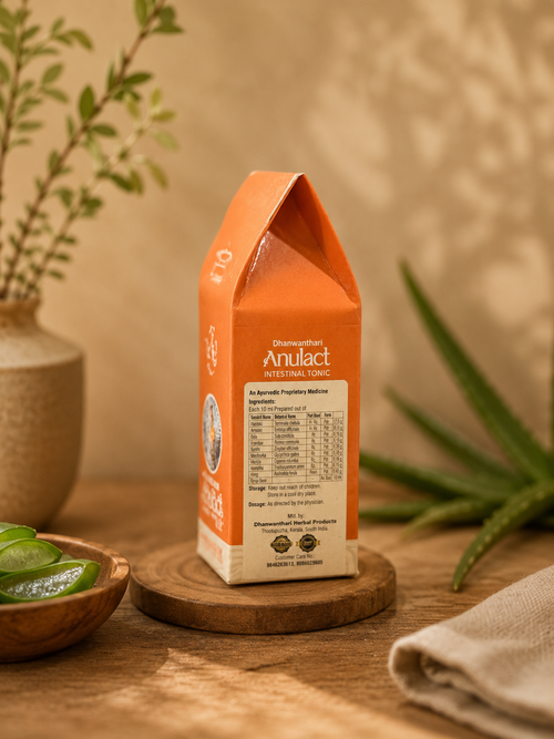 Side view of Herbalever Dhanwanthari Anulact Ayurvedic intestinal tonic showing ingredients and product information.